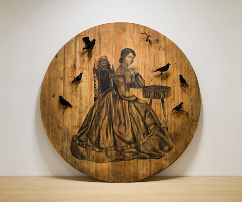 Whitfield Lovell (New York, New York, 1959 - ), "Because I Wanna Fly," 2021, conté on wood with attached found objects,  diameter: 114 in., Virginia Museum of Fine Arts.
