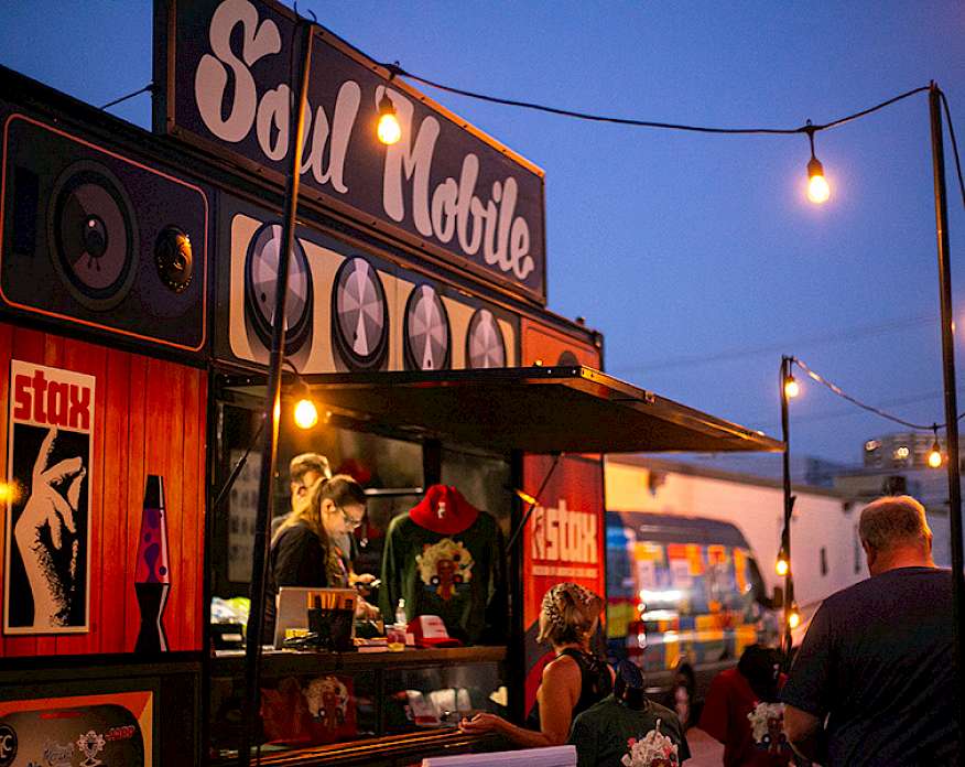 Photo of the Soul Mobile truck surrounded by people.