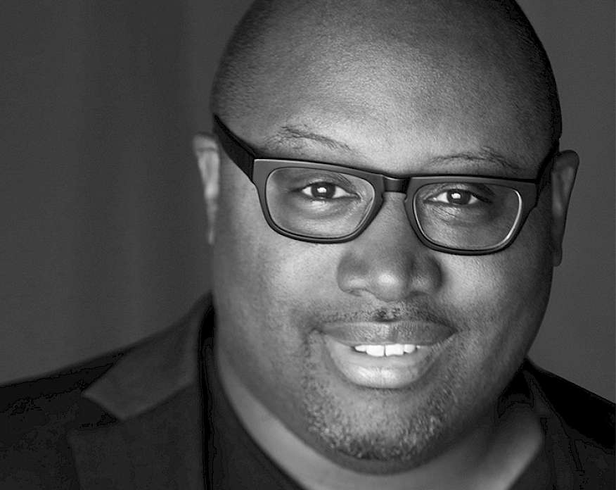 Black and white headshot of Kwame Brathwaite Jr.