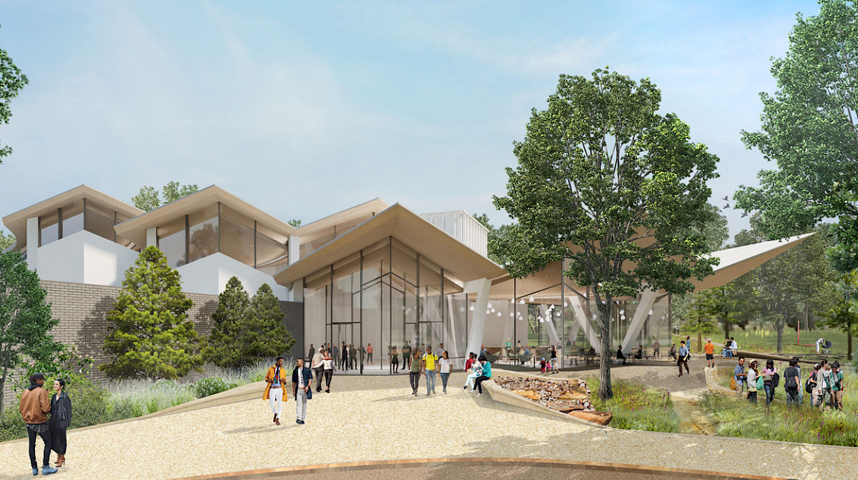 View of the new Park Entrance to the Arkansas Museum of Fine Arts from MacArthur Park. A new restaurant with an outdoor shaded terrace overlooks the park and connects to a new network of walking paths and stormwater-fed gardens designed by SCAPE. Image courtesy of Studio Gang and SCAPE.