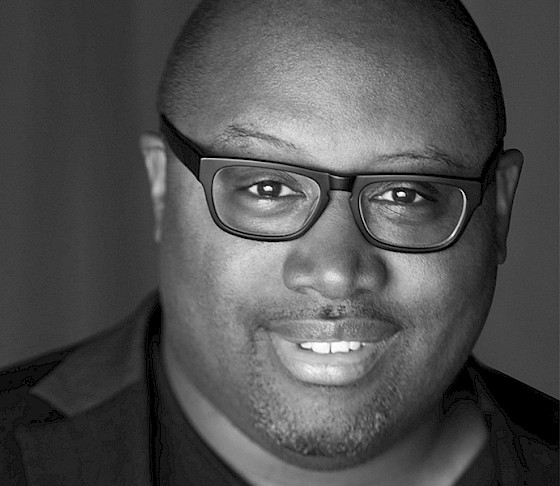 Black and white headshot of Kwame Brathwaite Jr.