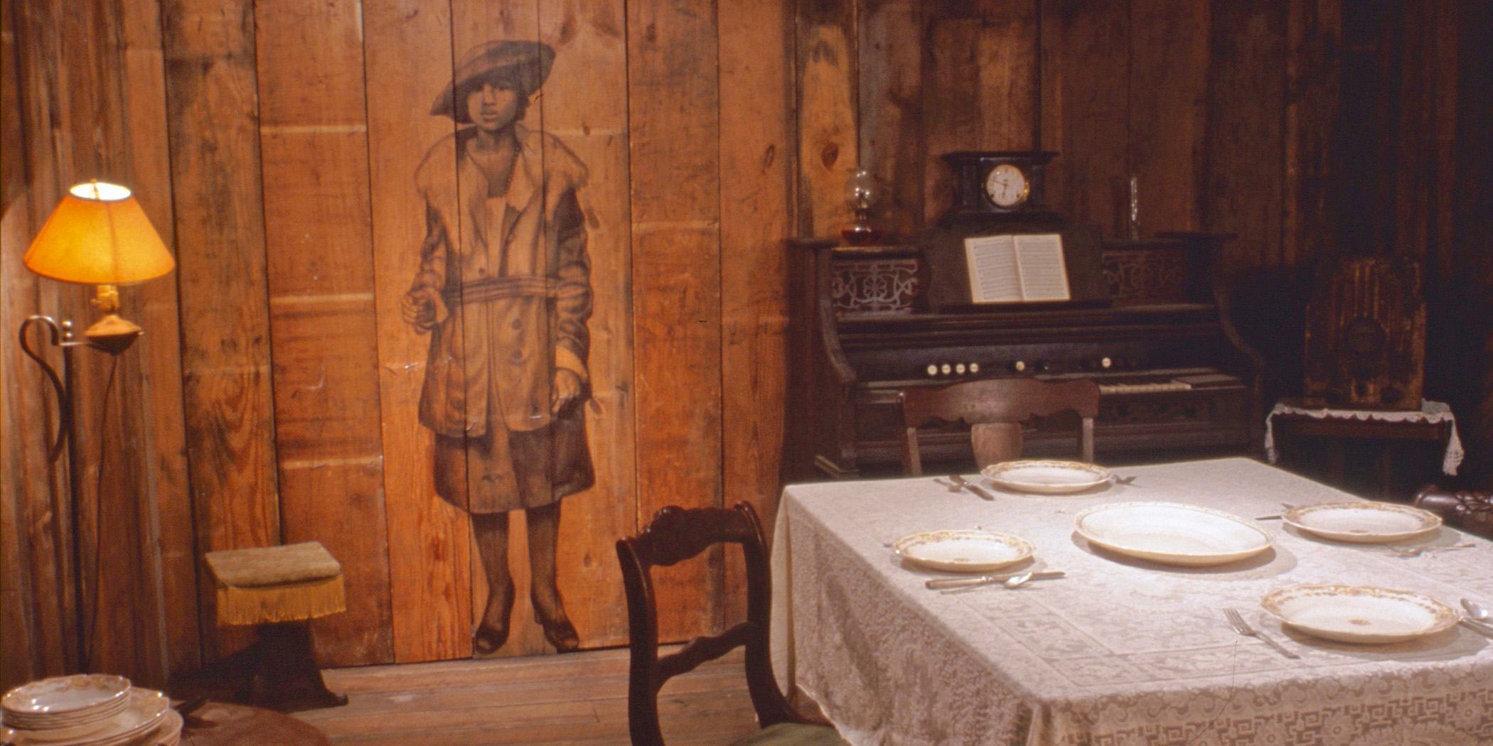 Photo of an art installation resembling a room in a Civil War-era home.
