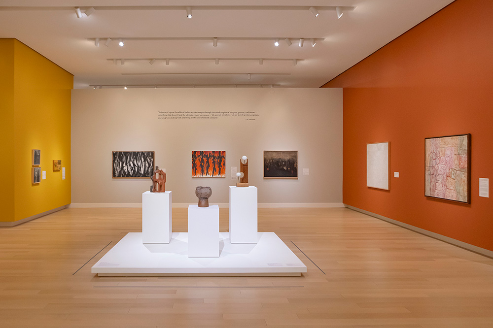 Photo of a gallery at the Arkansas Museum of Fine Arts displaying modern Native American art.