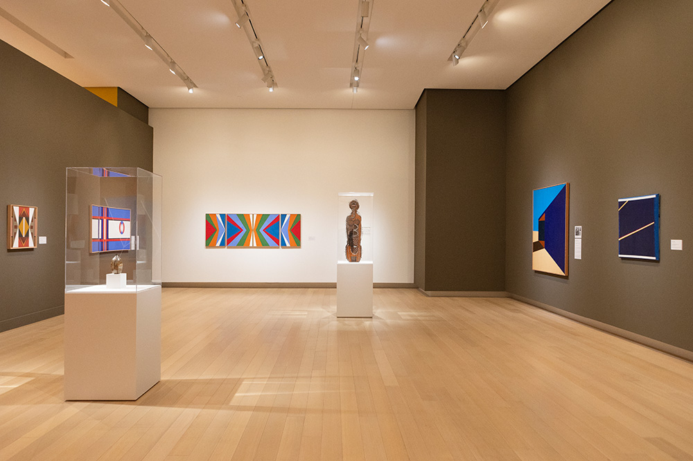 Photo of a gallery at the Arkansas Museum of Fine Arts displaying modern Native American art.