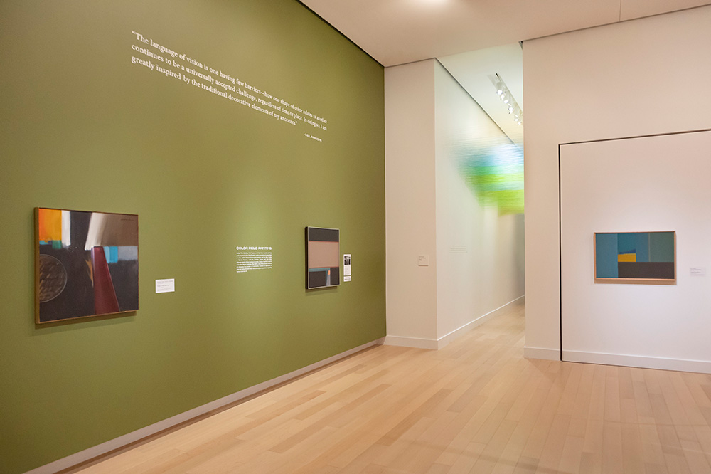Photo of a gallery at the Arkansas Museum of Fine Arts displaying modern Native American art.