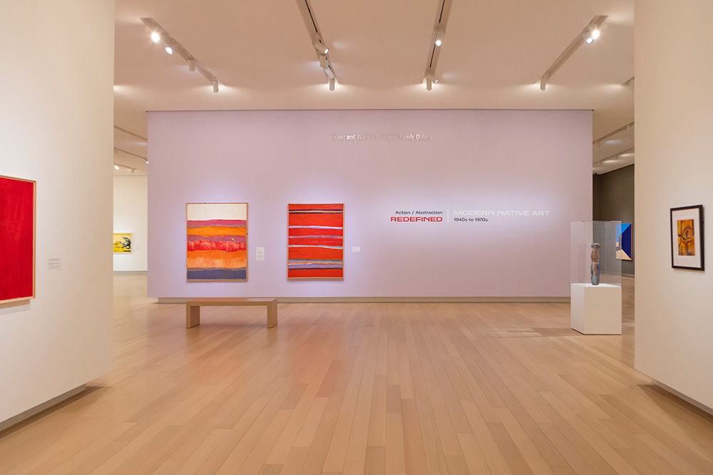 Photo of a gallery at the Arkansas Museum of Fine Arts displaying modern Native American art.