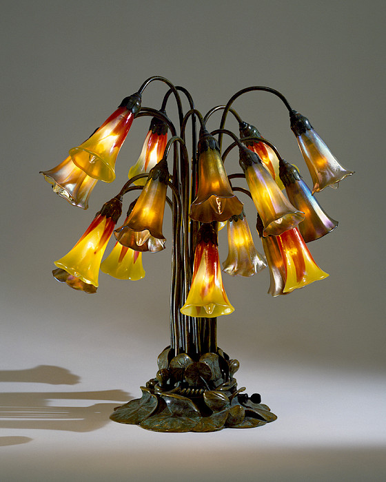 Photo of a 19th century Tiffany lamp with tulip-shaped glass light bulb shades.