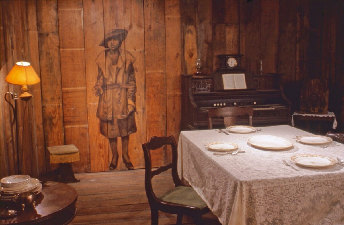 Photo of an art installation resembling a room in a Civil War-era home.