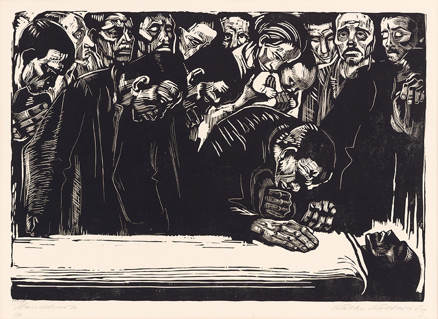 Photo of a black and white woodcut print by Kathe Kollwitz depicting a group of people mourning over a body.