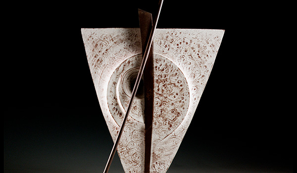 Detail photo of an abstract wooden and steel sculpture by Stoney Lamar.