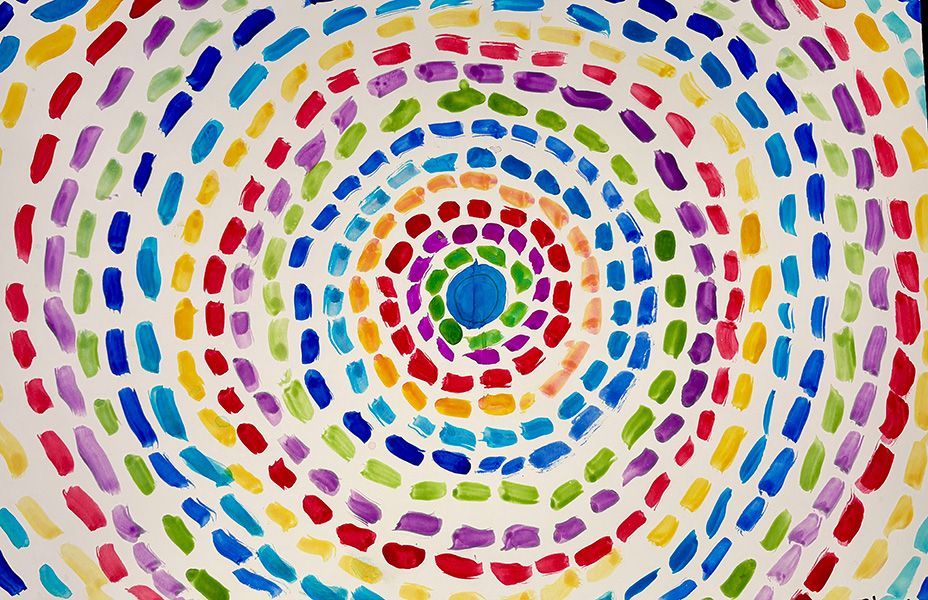 Watercolor painting of a concentric circles in a variety of colors.