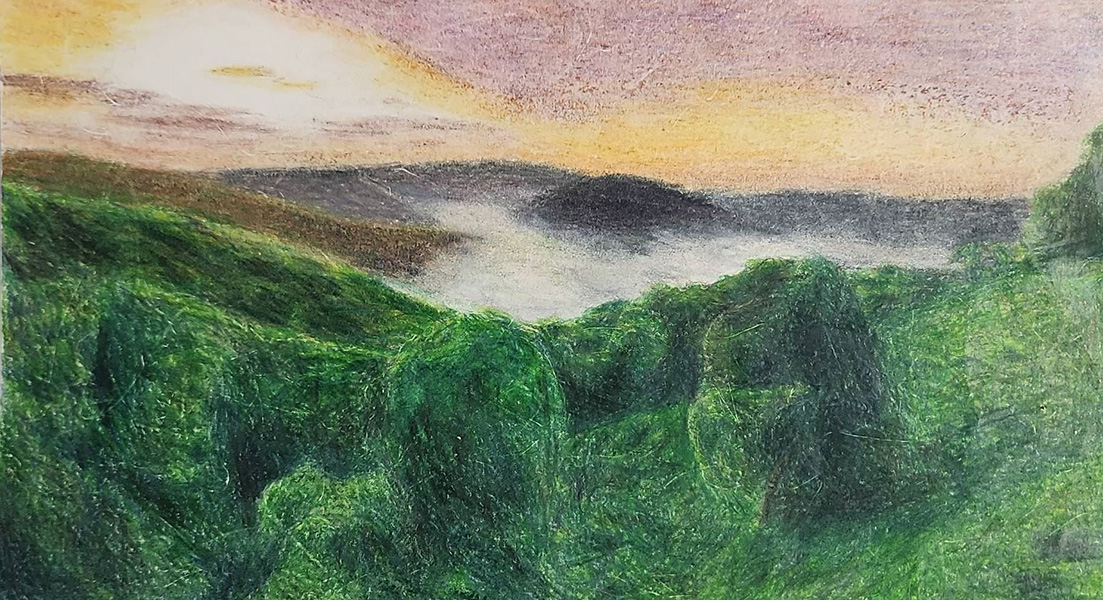 Colored pencil drawing of a valley with a black mountain under fog in the background.