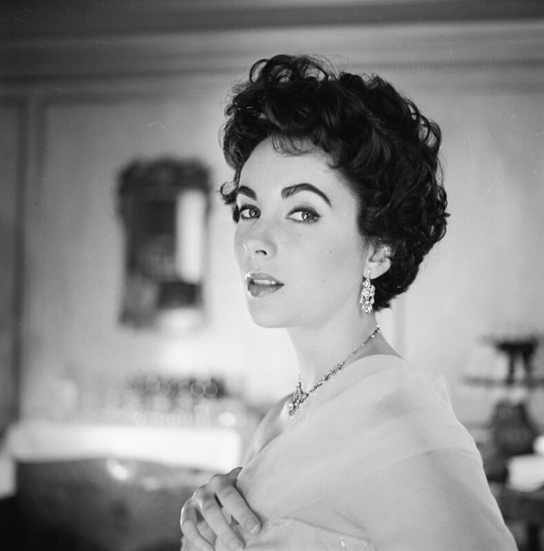Black and white headshot of Elizabeth Taylor.